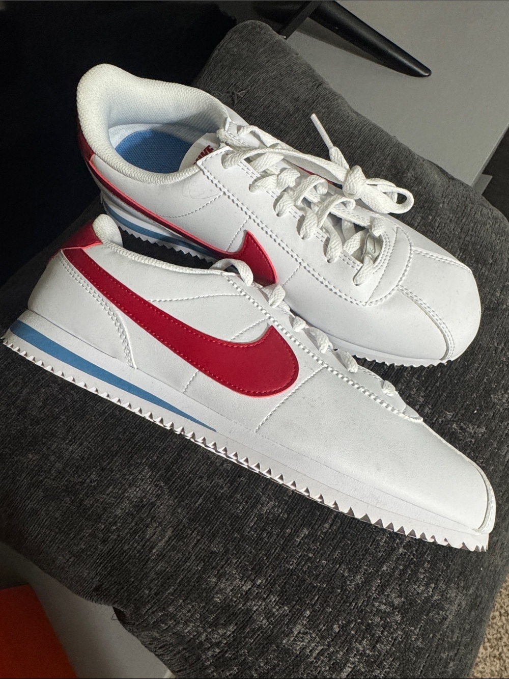 Nike White Cortez Sneakers with Red Swoosh Accent Youth size 7. Woman’s size 8.5